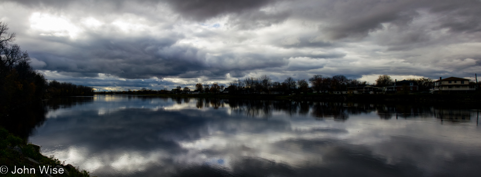 Still waters and reflecting sky in French Canada off the St. Lawrence Seaway