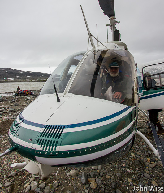 John Hoffman about to heli-portage the Tweedsmuir Glacier and Turnback Canyon on the Alsek River in British Columbia, Canada