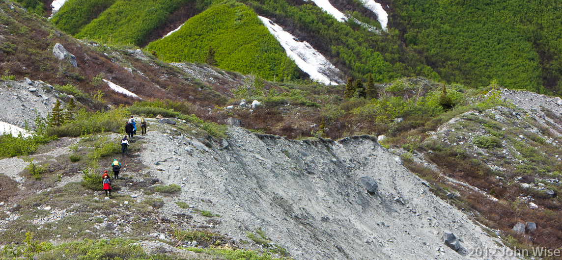 A thin ridge line being hiked for a closer view of the western side of Lowell Glacier in Kluane National Park Yukon, Canada