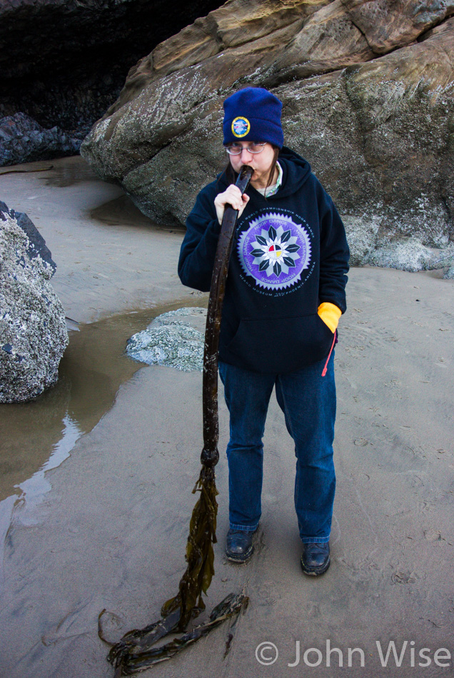 Caroline Wise "playing" kelp on the Oregon coast