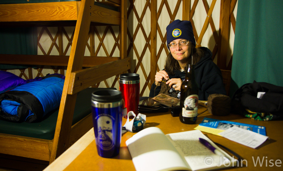 Caroline Wise knitting gloves in a yurt at Nehalem Bay State Park in Oregon