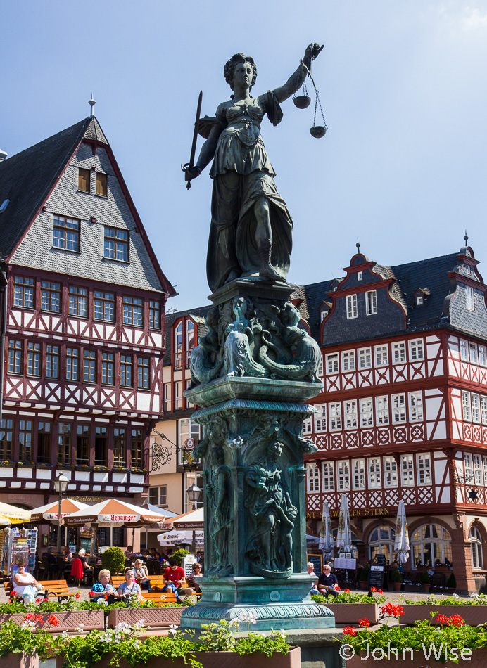 Lady Justice standing vigil at Römer in Frankfurt, Germany