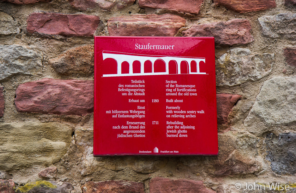 A sign pointing out a few details regarding the old city wall in Frankfurt, Germany