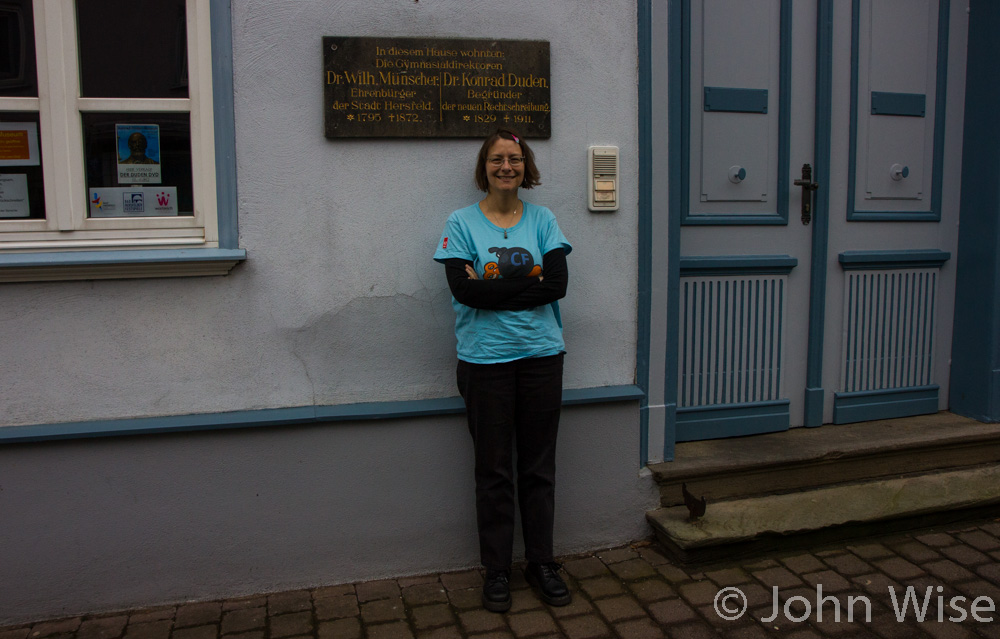 Caroline Wise in front of the house where Konrad Duden lived in Bad Hersfeld, Germany