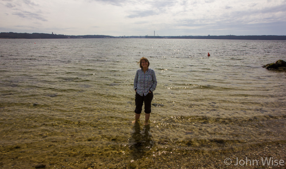 Caroline Wise standing in the Baltic Sea at Lillestrand in Denmark
