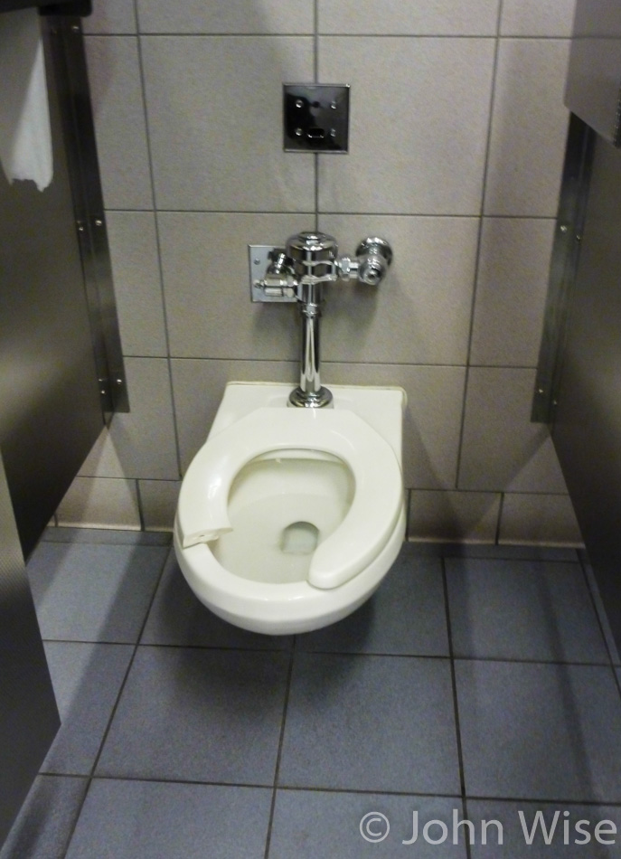 Broken toilet seat at the Newark airport
