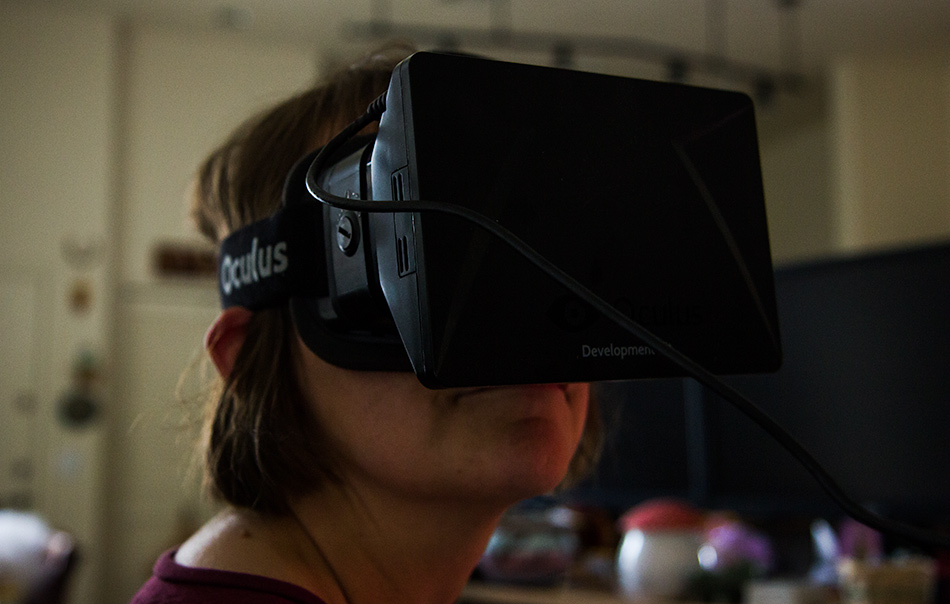 Caroline Wise wearing the Oculus Rift checking out the Grand Canyon in virtual reality