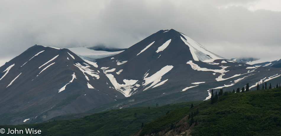 Still some snow on the mountains along the Alsek River in Yukon, Canada