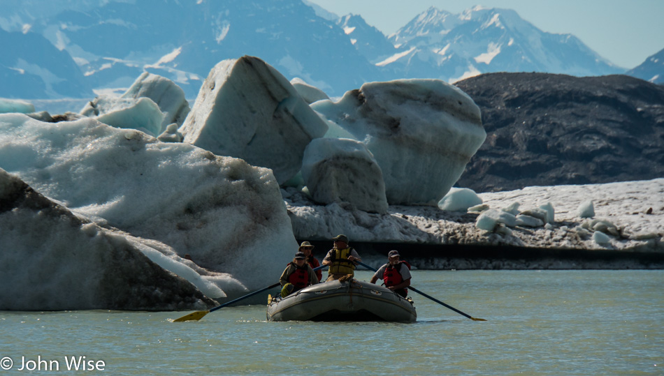 Thirsty's raft in front of icebergs on Lowell Lake in Kluane National Park Yukon, Canada