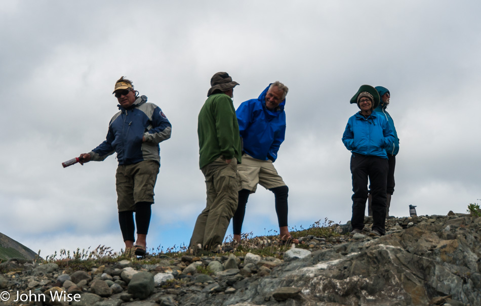 Taking a break after surviving Lava North on the Alsek River in Yukon, Canada