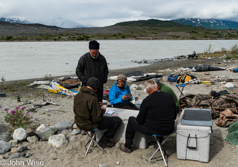 Playing cards next to the Alsek River in British Columbia, Canada