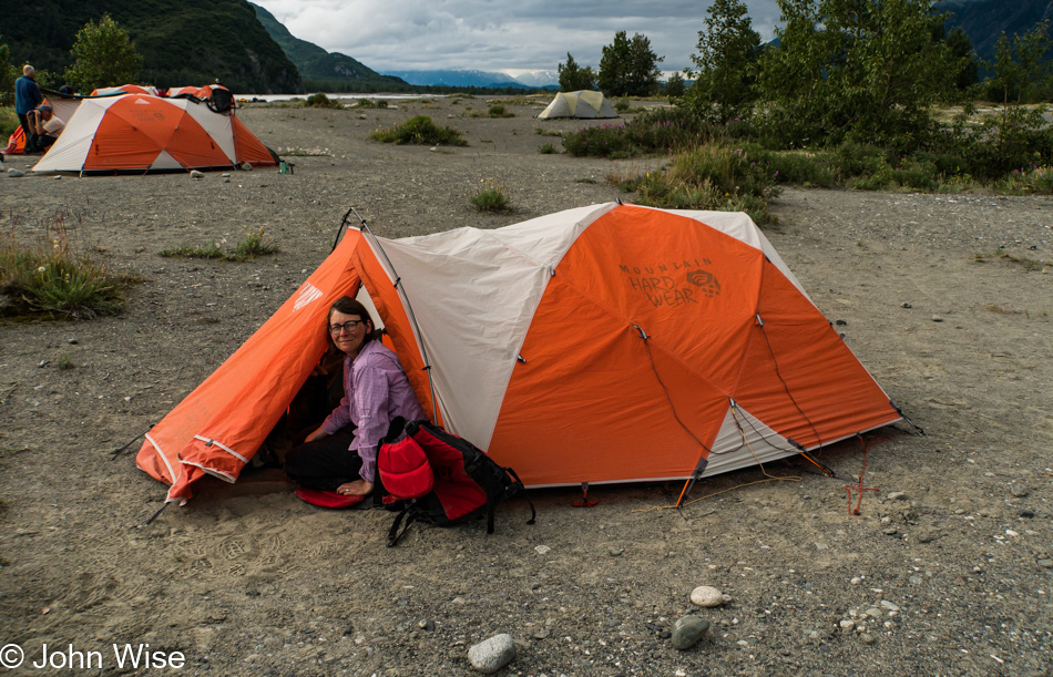 Caroline Wise camping next to the Alsek River in British Columbia, Canada