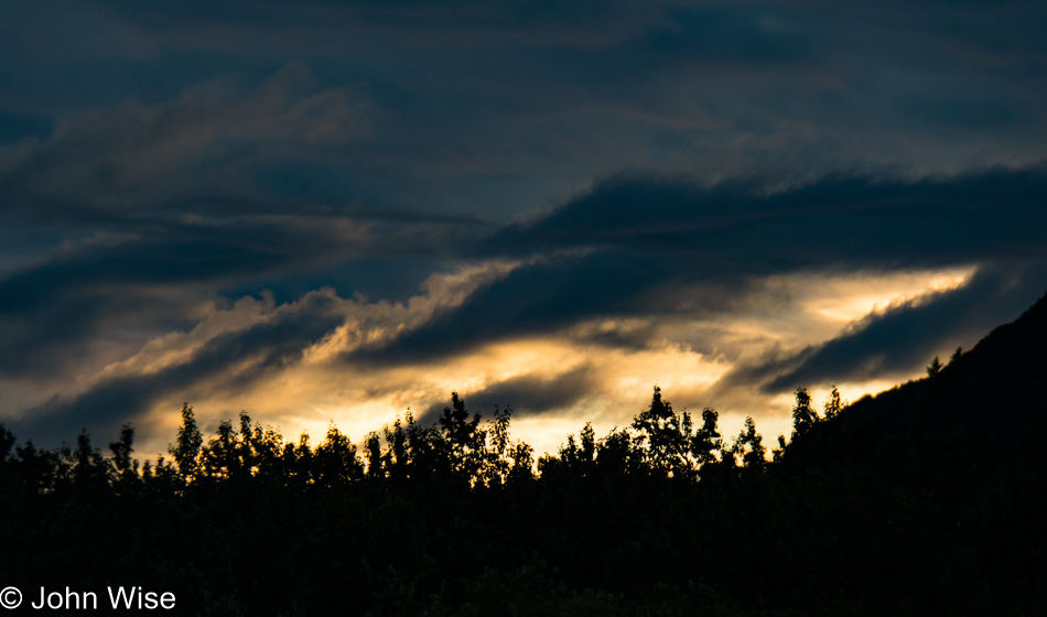 Sunset over the Pacific Ocean as seen from Alsek Lake in Alaska