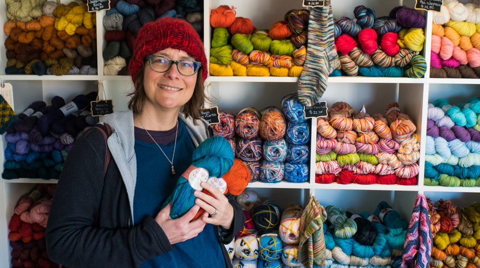 Caroline Wise buying yarn at Monarch Knitting in Pacific Grove, California