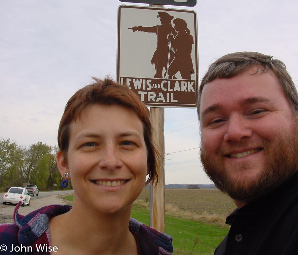 Caroline Wise and John Wise stopping for a selfie in front of a Lewis & Clark trail sign in Missouri