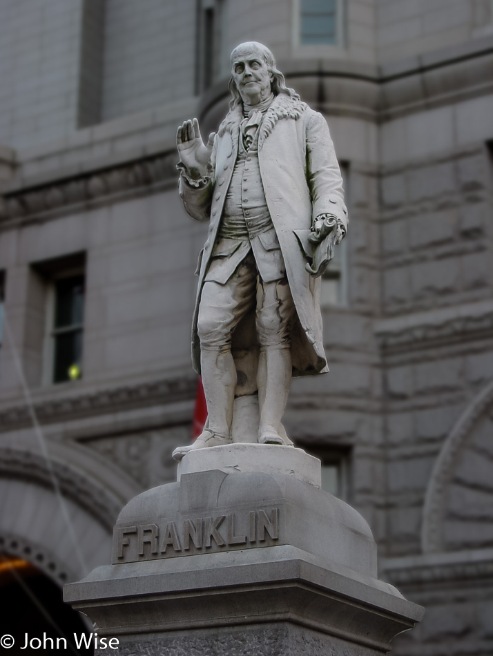 Benjamin Franklin in front of the Old Post Office in Washington D.C.