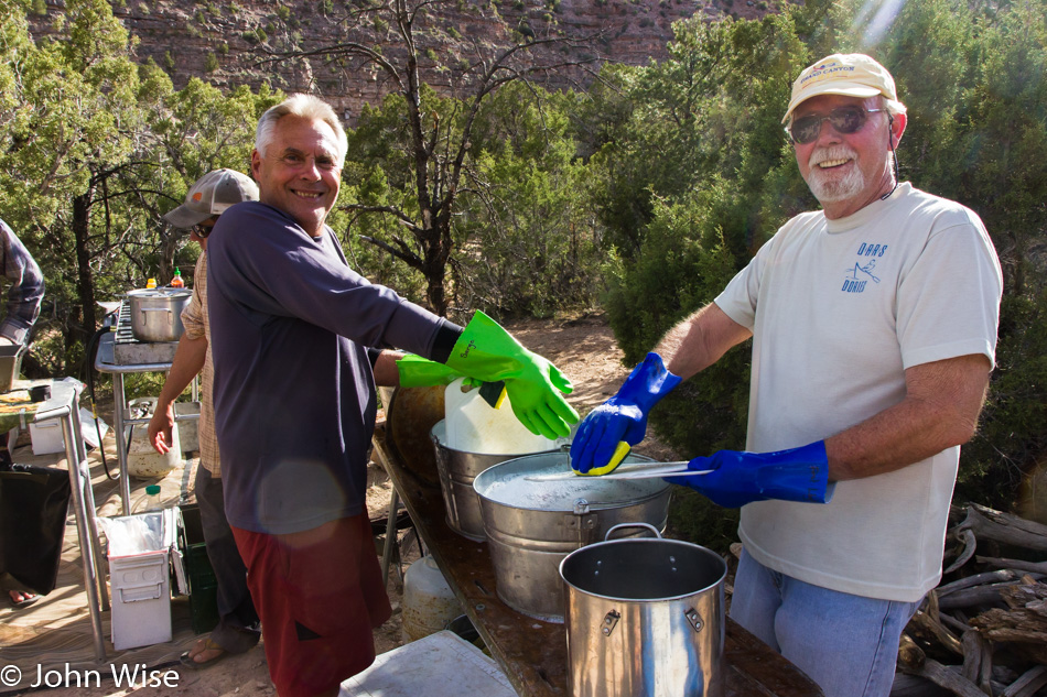 Steve Alt (Sarge) and Frank Kozyn (First Light Frank) washing dishes off the Yampa river in Dinosaur National Monument Colorado