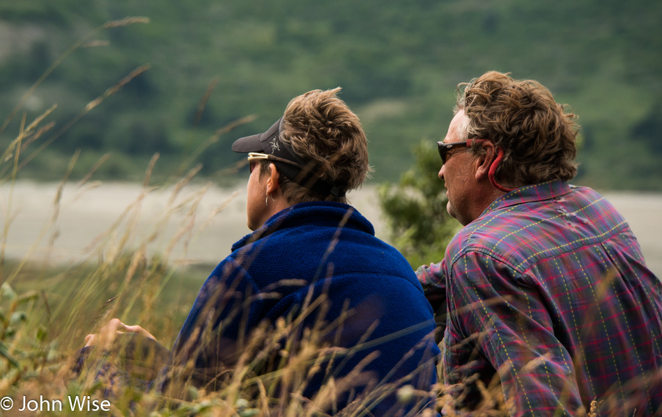 Bruce Keller and Echo Miller looking out towards Mount Blackadar along the Alsek in British Columbia, Canada