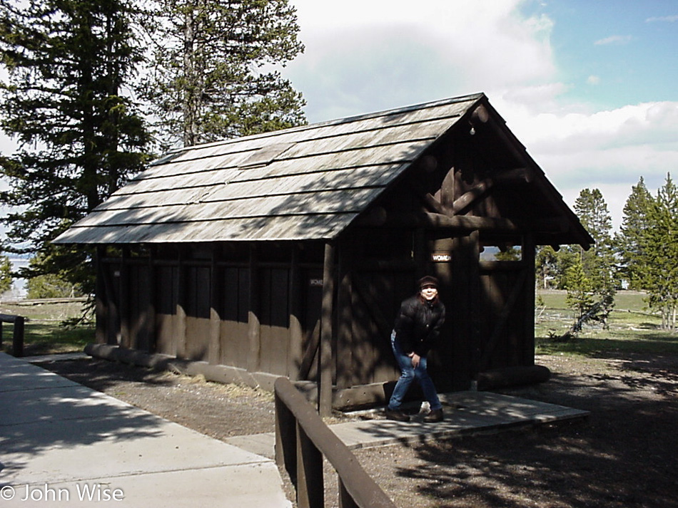 Ruby Rieke at a toilet house in Yellowstone National Park Wyoming
