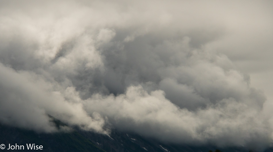 Low clouds in front of the Tweedsmuir Glacier in British Columbia, Canada
