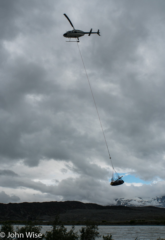 Our gear being lifted for a heli-portage at Tweedsmuir Glacier in British Columbia, Canada