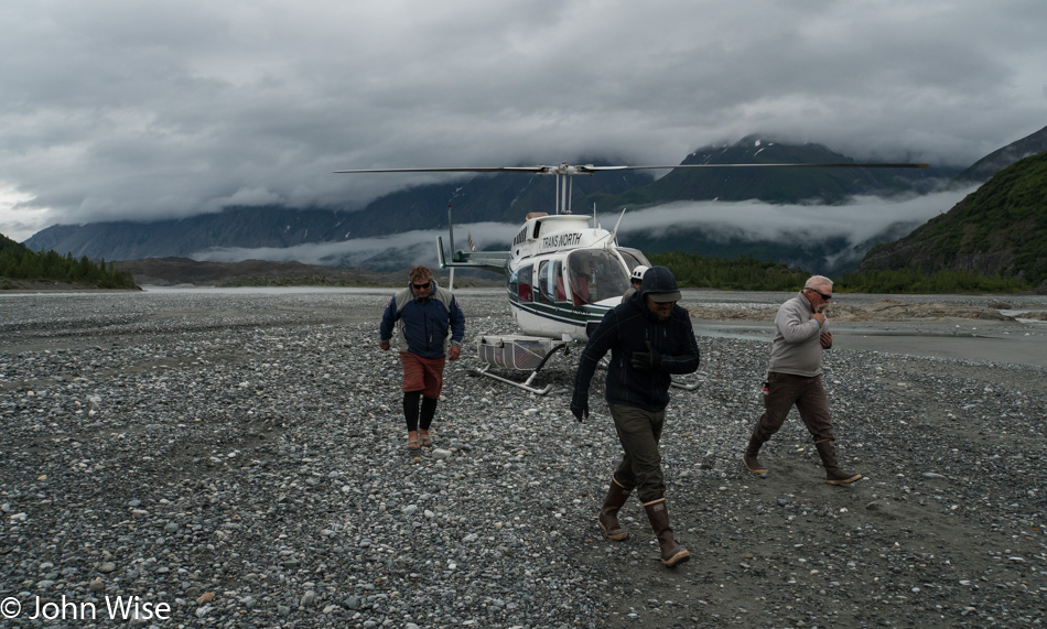 Our boatmen saying goodbye to our helicopter pilot on the Alsek River in British Columbia, Canada