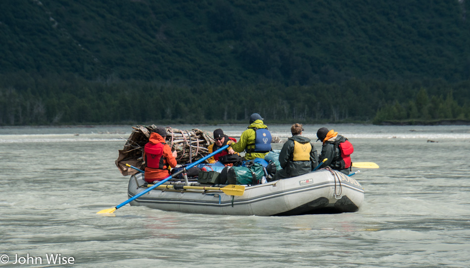 Firewood collection on a raft on the Alsek River in British Columbia, Canada
