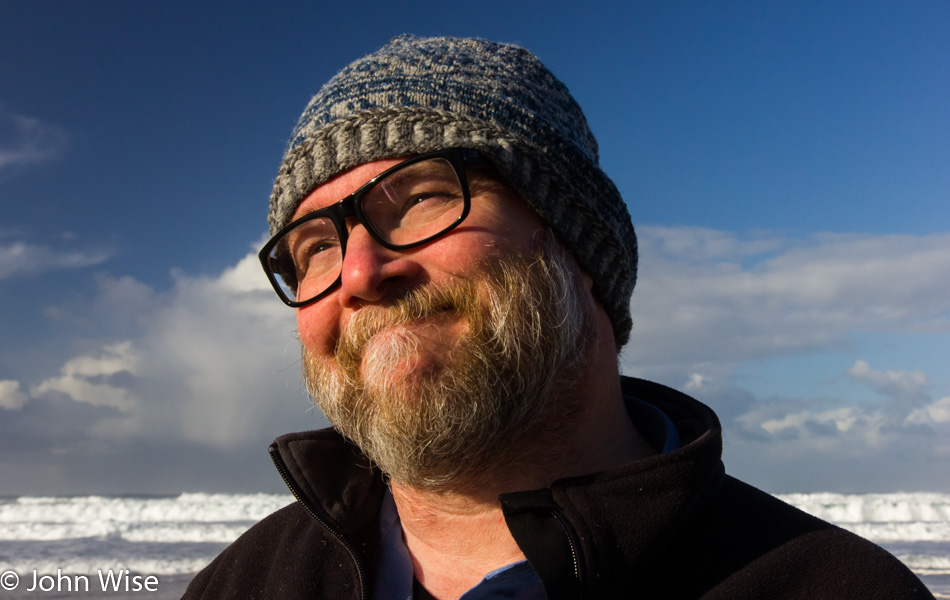 John Wise wearing a hand knitted beanie made by Caroline Wise