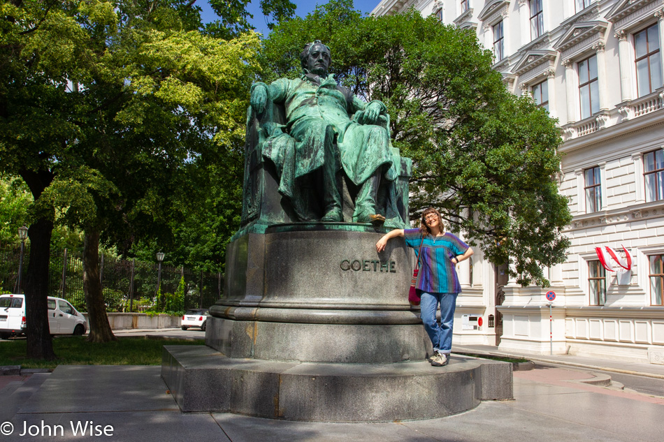 Caroline Wise and statue of Goethe in Vienna, Austria
