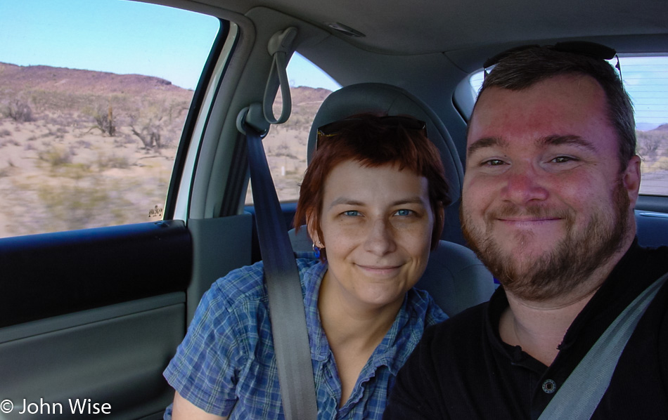 Caroline Wise and John Wise in Arizona desert driving west