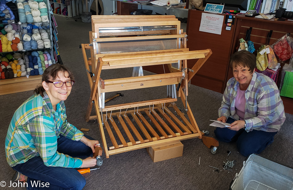 Caroline Wise and Carma Koester of Fiber Creek in Prescott, Arizona with a new Baby Wolf Loom from Schacht 