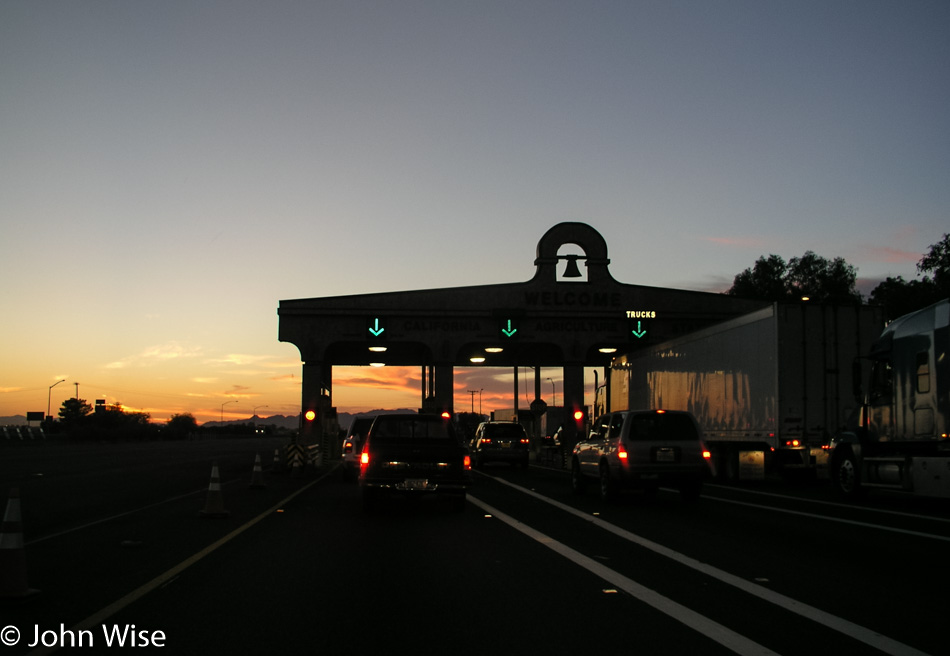 Driving into California at sunset