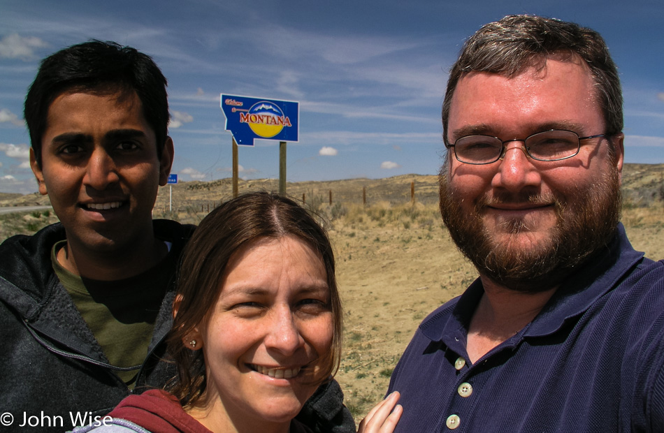 Jay Patel, Caroline Wise, and John Wise at the state sign in Montana
