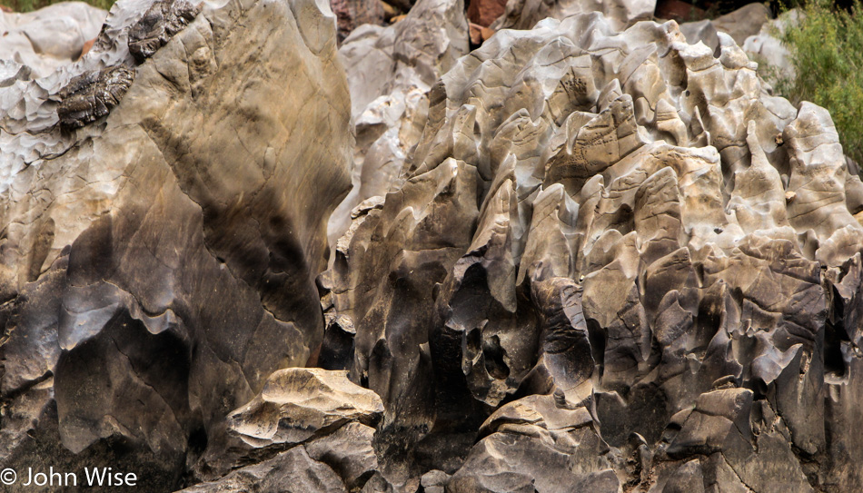 Water carved formations next to the Colorado River in the Grand Canyon