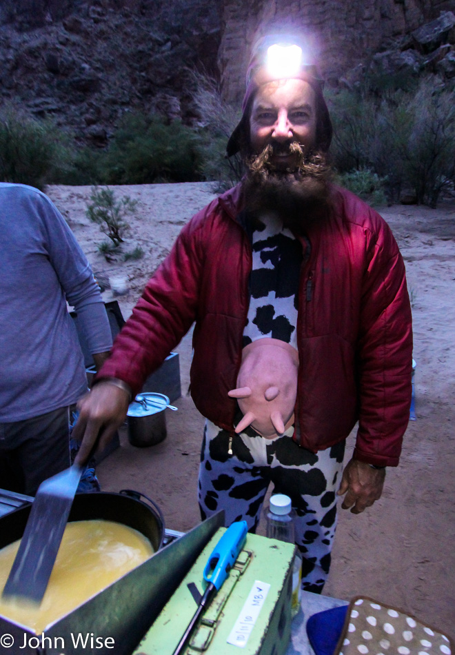 Boatman Steve Kenny preparing breakfast in the Grand Canyon