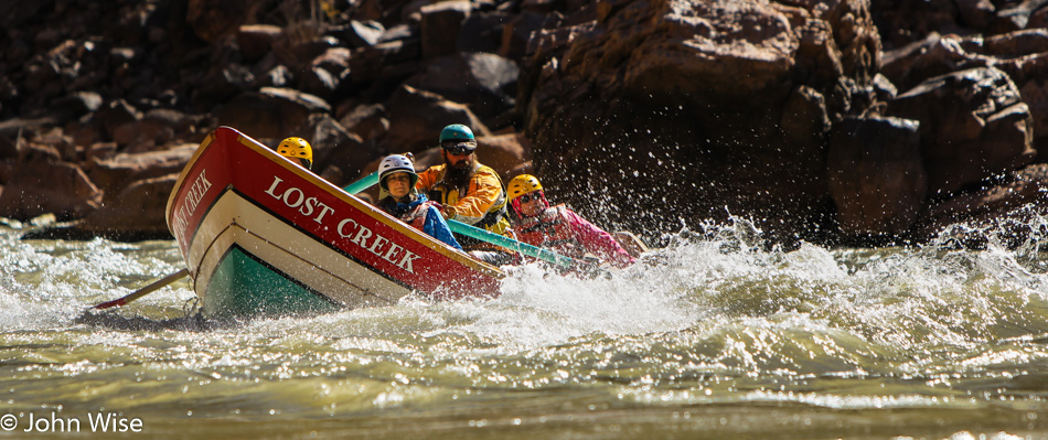 Steven Kenny piloting the Lost Creek Dory in the Grand Canyon