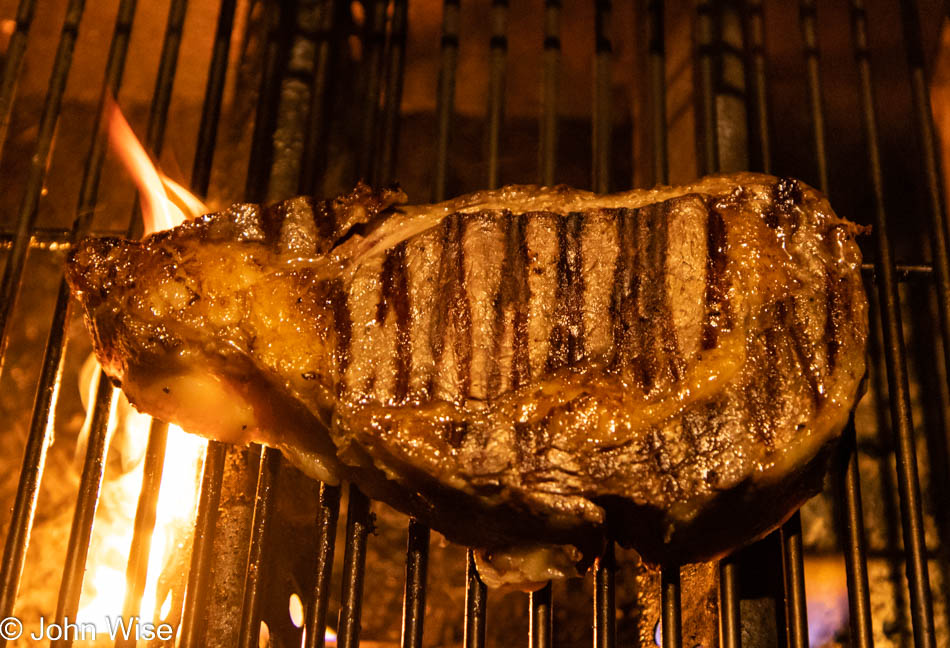 Steak from Cattleman's Exchange in Canadian, Texas on the grill at Hart's Camp in Pacific City, Oregon