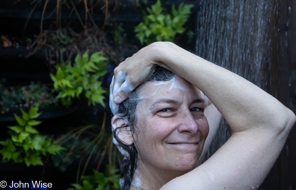 Caroline Wise Showering Outdoors at Hart's Camp in Pacific City, Oregon