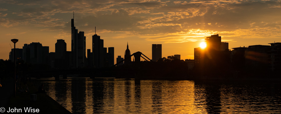 Sunset on the Main River with city skyline of Frankfurt, Germany