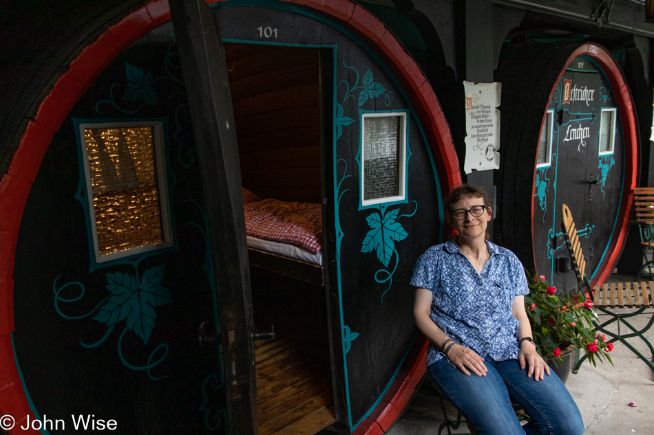 Caroline Wise in a wine barrel at Lindenwirt Hotel in Rüdesheim, Germany