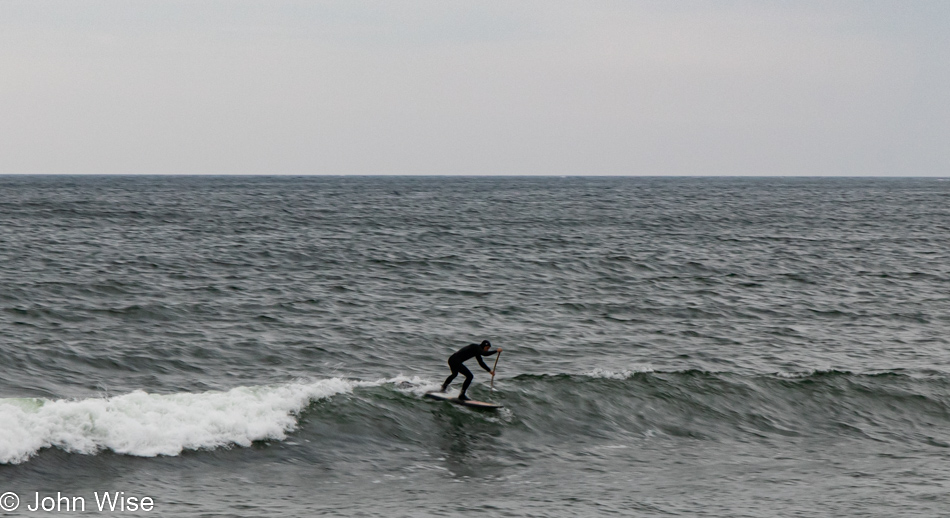 Surfing the Baltic Sea on a blustery day in Binz on Rügen, Germany
