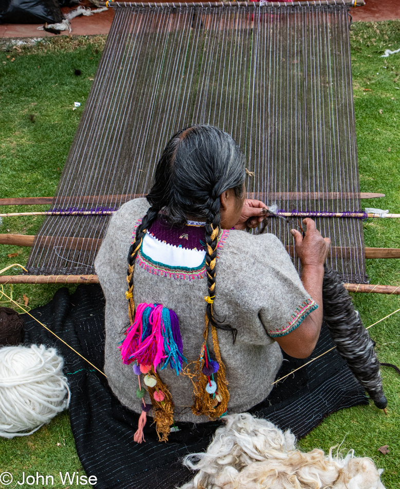 Maruch demonstrating backstrap weaving in Chilimjoveltic, Chiapas, Mexico