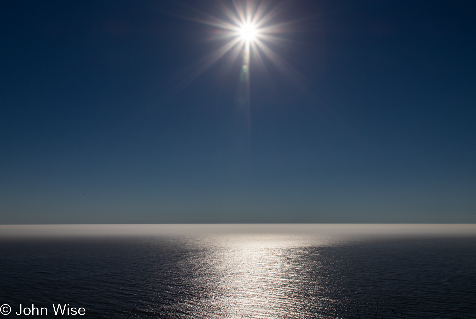 Sun and silvery sea on Highway 1, California