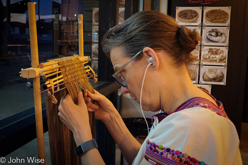 Caroline Wise braiding a shawl in Phoenix, Arizona