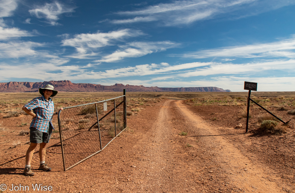 Caroline Wise at the Soap Creek Trail gate between Vermilion Cliffs National Monument and the Grand Canyon in Arizona