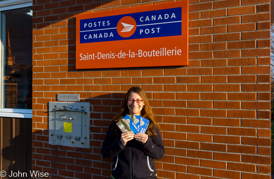 Caroline Wise at the post office in Saint-Denis-De La Bouteillerie, Quebec, Canada