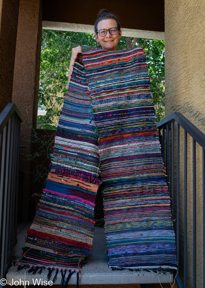 Caroline Wise with her newest handwoven piece of cloth in Phoenix, Arizona