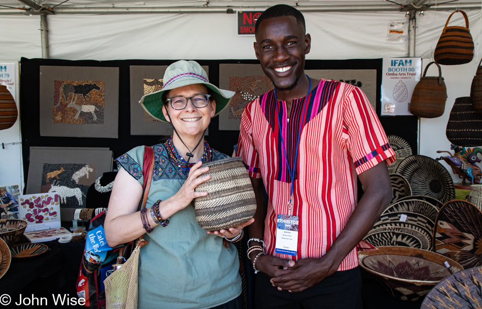 Caroline Wise and Benson Kuzai of Omba Arts Trust (Namibia) at the International Folk Art Market in Santa Fe, New Mexico