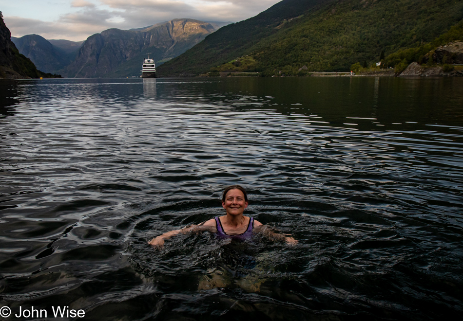 Caroline Wise swimming in Aurlandfjord at Fjord Sauna in Flåm, Norway