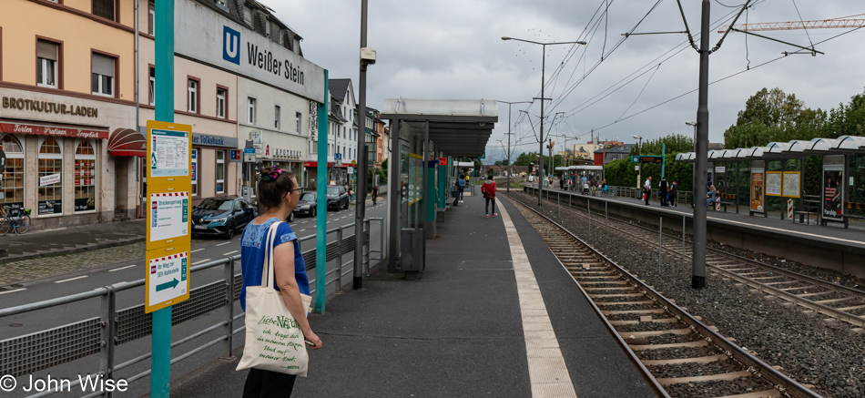 Caroline Wise at a tram stop in Frankfurt, Germany